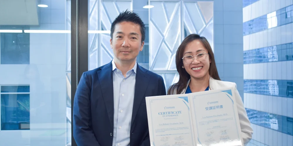 Dra. Lea Escabarte receiving her training completion certificate from Dr. Tadateru Maehata last May 22, 2025